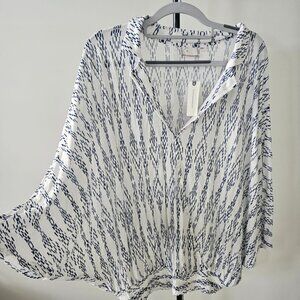 Anthropologie. Blouse. Size M. Color white and navy blue. NWT